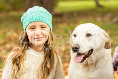 Smiling young girl with her dog