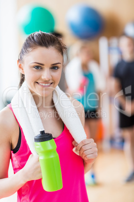 Fit woman smiling at camera Fit woman smiling at camera