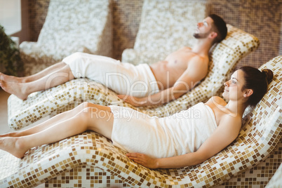 Man and woman lying down together