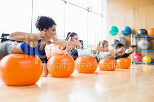 Fitness class exercising in the studio