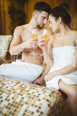 Romantic couple together with champagne glasses