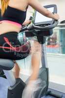 Woman exercising on an exercise bike
