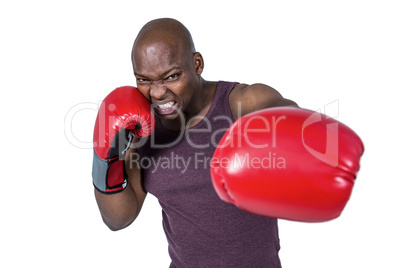 Fit man with boxing gloves