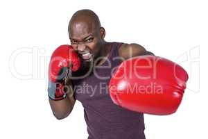 Fit man with boxing gloves