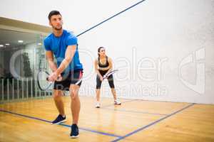 Couple play some squash together