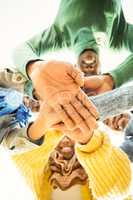 Young family doing a head circles and joining their hands