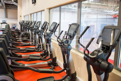 Collection of cross trainer machines in a row