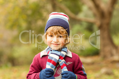 Smiling little boy posing for camera