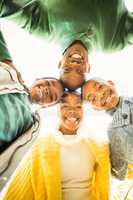 Young family doing a head circles