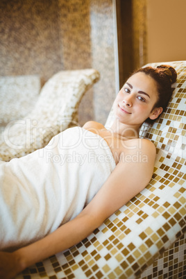 Woman relaxing while lying down