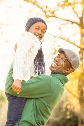 Young father holding his daughter
