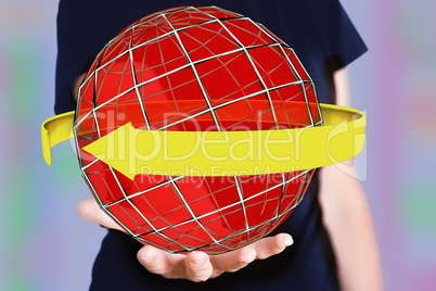 Hand holding sphere with orbiting arrow