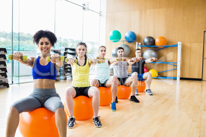 Fitness class exercising in the studio