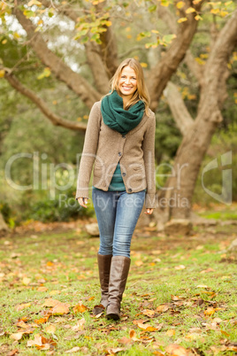 Smiling woman walking to the camera