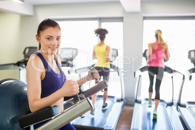 Fit woman smiling at camera