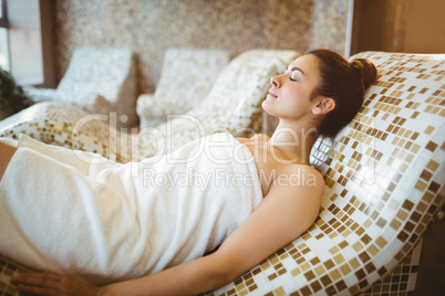 Woman relaxing while lying down