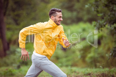 Happy man running on a hike