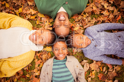 Young family doing a head circles