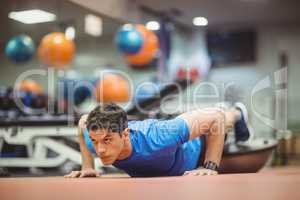 Fit man working out in studio