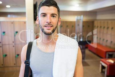 Smiling man about to go to the gym