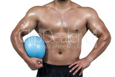 Muscular man working out with weight