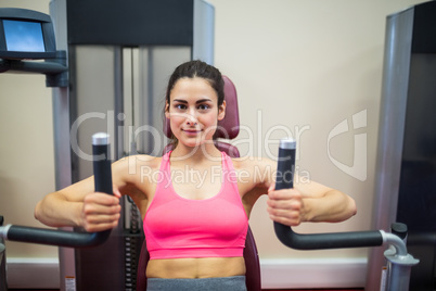 Determined woman working out