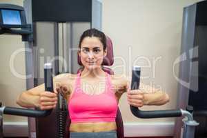 Determined woman working out