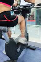 Woman using an exercise bike