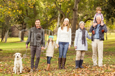 Extended family posing with warm clothes