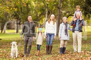 Extended family posing with warm clothes