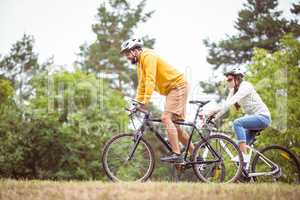 Happy couple on a bike ride