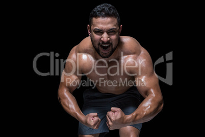 Bodybuilder man flexing his muscles