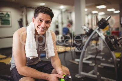 Fit man taking a break from working out