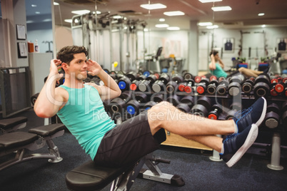 Fit man doing sit ups