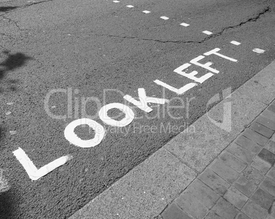 Black and white Look Left sign