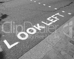 Black and white Look Left sign