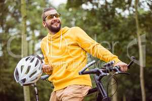 Handsome man with mountain bike