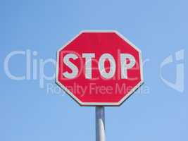 Stop sign over blue sky