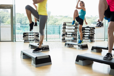 Fitness class exercising in the studio