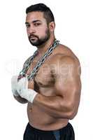 Muscular man with a chain