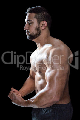 Portrait of a bodybuilder man flexing muscles