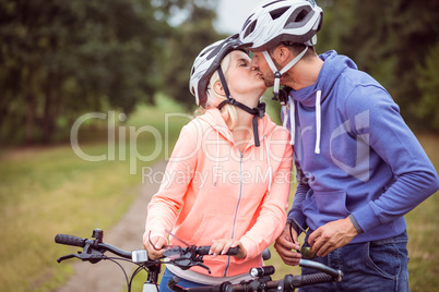 Happy couple on a bike ride