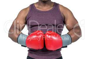 Fit man with boxing gloves