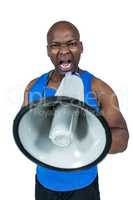 Fit trainer shouting through megaphone