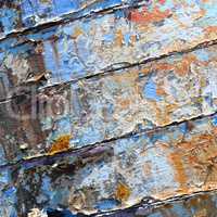 Old boat with peeling paint background texture