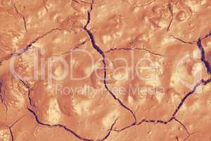 Soft cracked earth background.