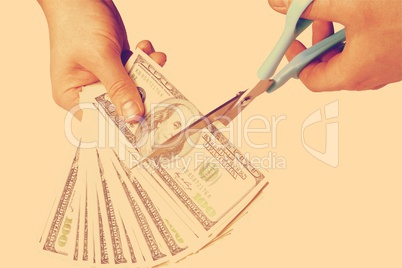 Male hands cut money