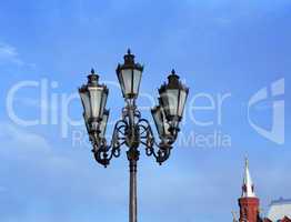 lantern and capstan on sky background