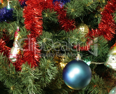 many of toys on green christmas fir