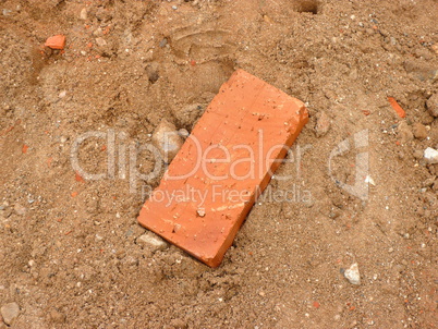 one brick on sand